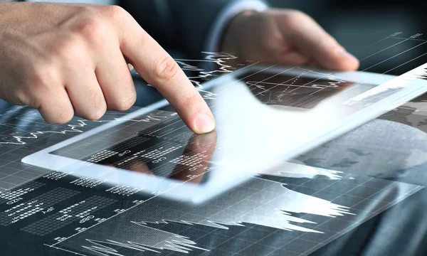 Businessman touching screen of tablet computer — Stock Photo, Image