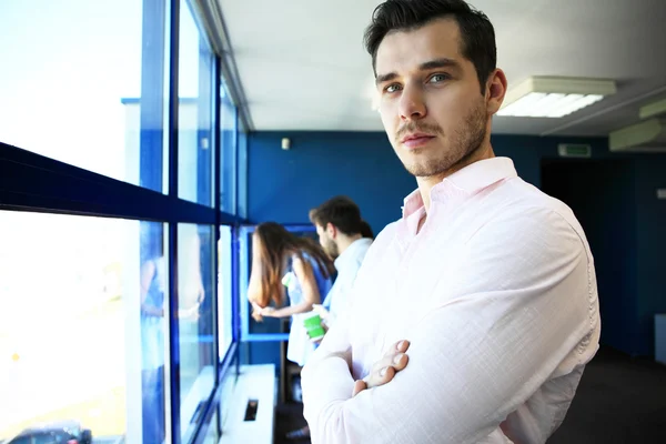 Portrait of a businessman looking at window — Stock Photo, Image