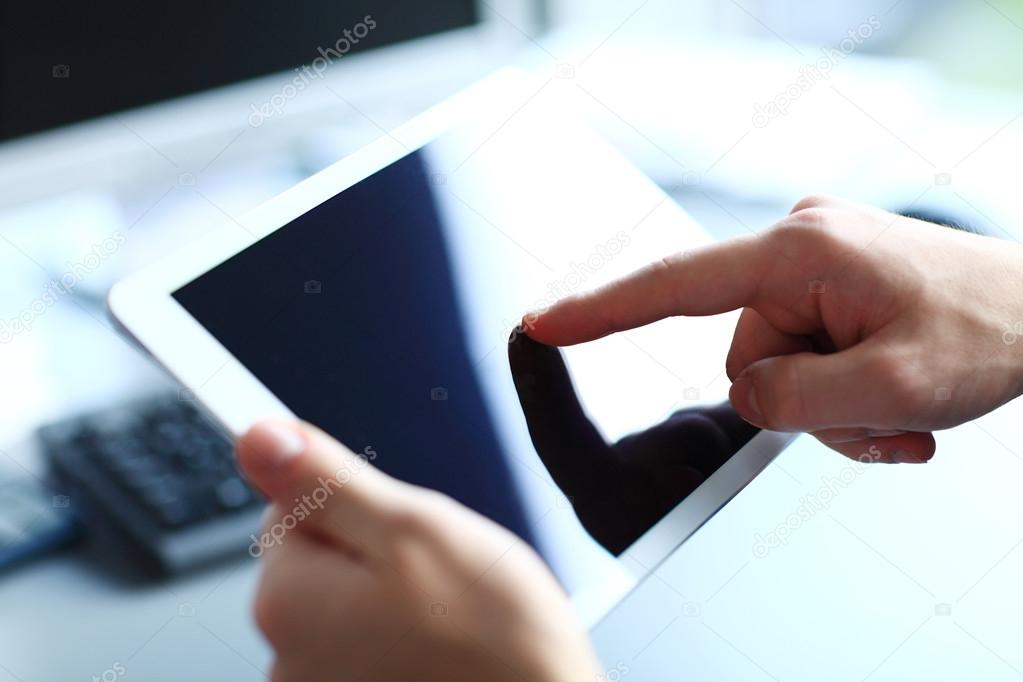 Office worker using a touchpad