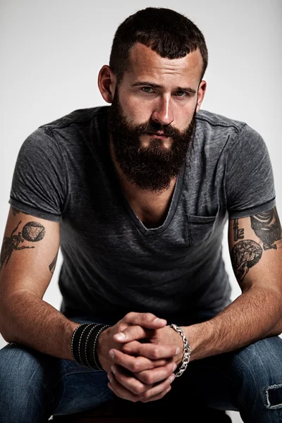 Bearded man with tattoos — Stock Photo, Image