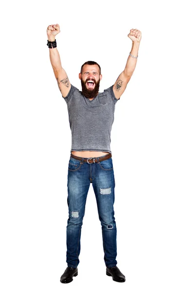 Tetovaný vousatý muž s rukama zvedl v úspěch — Stock fotografie