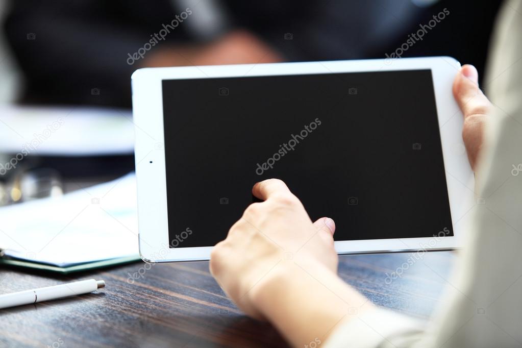 Office worker using a touchpad