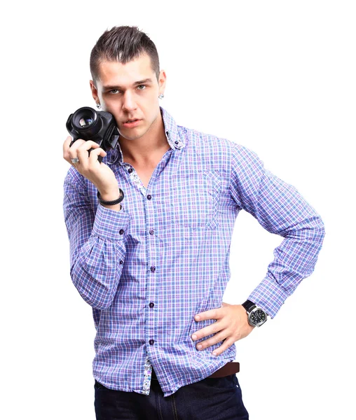 Mladý muž hospodářství fotoaparát — Stock fotografie