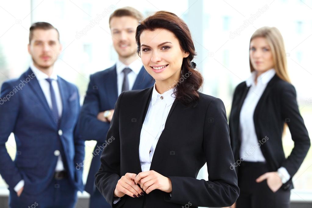 Woman on the background of business people