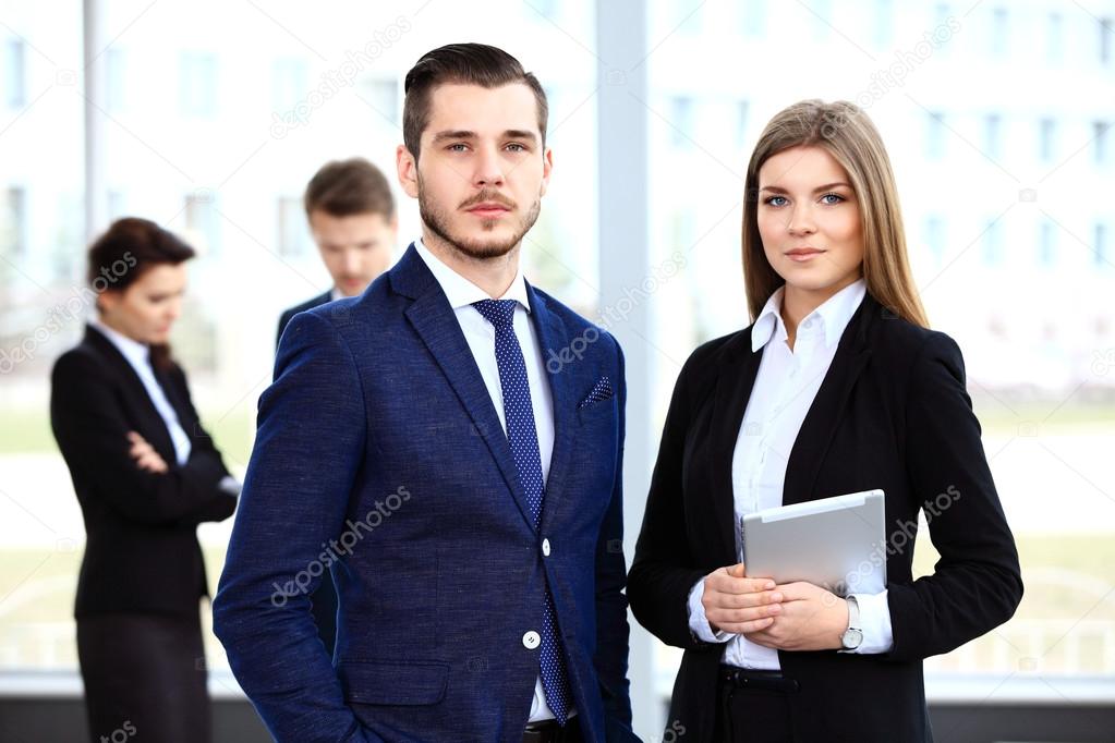 Business partners discussing documents and ideas