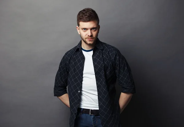 Portrait of young handsome man in t-shirt. — Stock Photo, Image