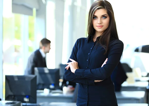 Woman on background of business people — Stock Photo, Image