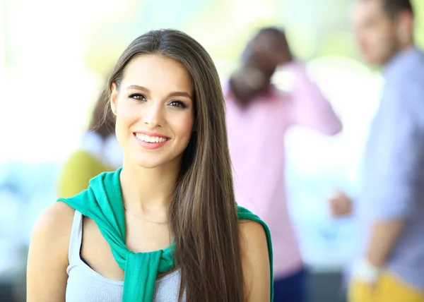 Woman on  background of business people — Stock Photo, Image