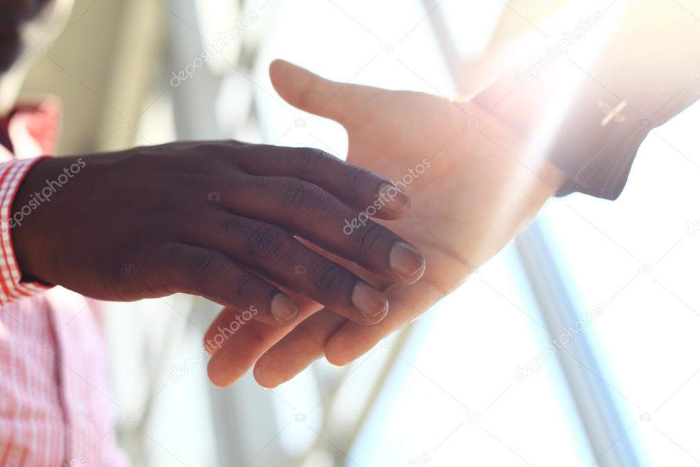 Business people shaking hands