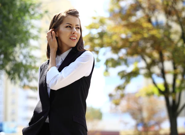 Successful business woman smiling — Stok fotoğraf