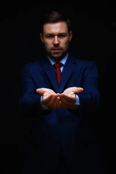 Zakenman vragen om geld. hand symbool — Stockfoto