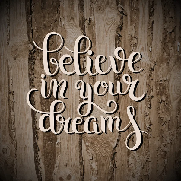Modern kalligrafi positiva citat tror på dina drömmar inskrivet — Stock vektor