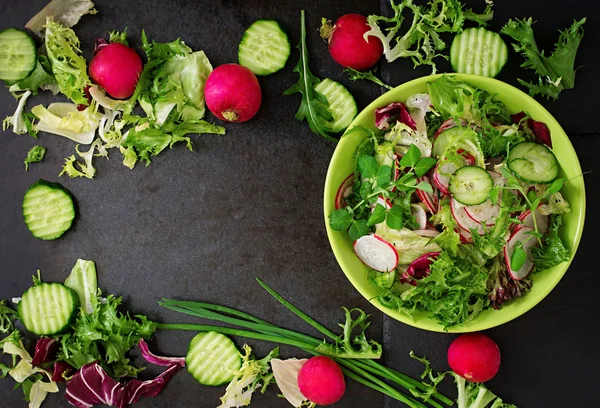 Salad of cucumbers, radishes and herbs. — Stock Photo, Image