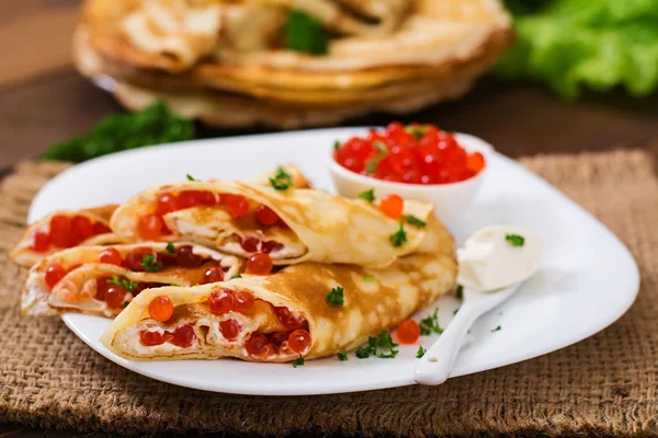 Pancakes with red caviar — Stock Photo, Image