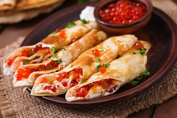 Pancakes with red caviar — Stock Photo, Image