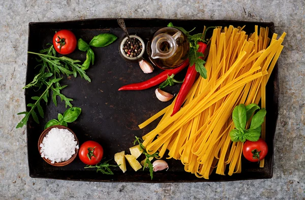 Pasta Tagliatelle and ingredients for cooking — Stock Photo, Image