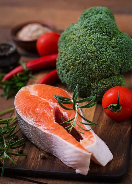 Raw steak salmon and vegetables for cooking — Stock Photo, Image