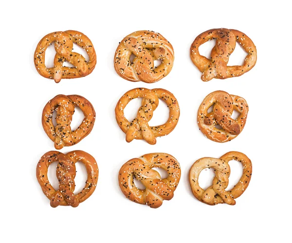 Pretzels con sal y semillas de sésamo — Foto de Stock