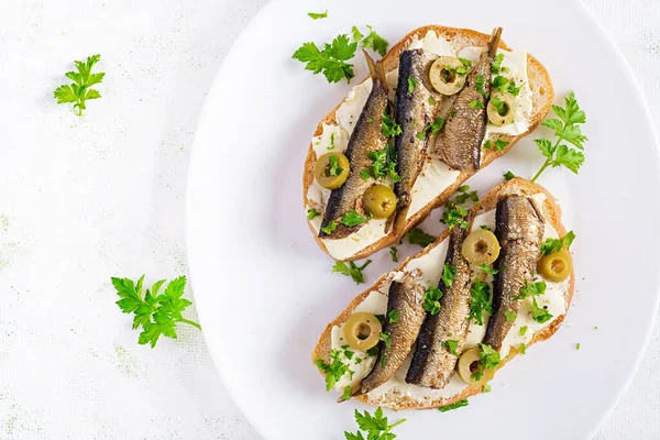 Sandwich Smorrebrod Sprats Green Olives Butter Light Table Danish Cuisine — Stock Photo, Image