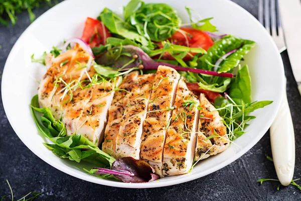 Grilled chicken fillet with salad. Keto, ketogenic, paleo diet. Healthy food.  Diet lunch concept.
