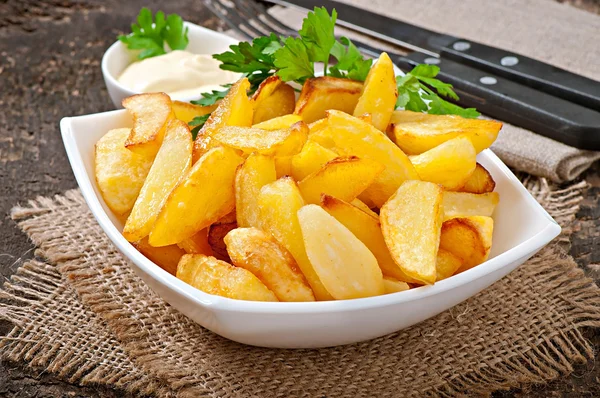 Cunhas de batata fritas — Fotografia de Stock