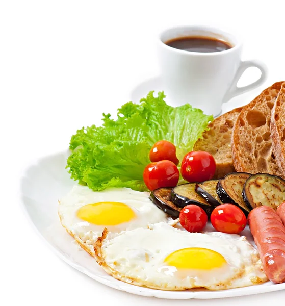 Fried eggs, sausages, eggplant and tomatoes — Stock Photo, Image