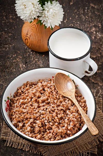 Buckwheat in an old bowl — Stock Photo, Image