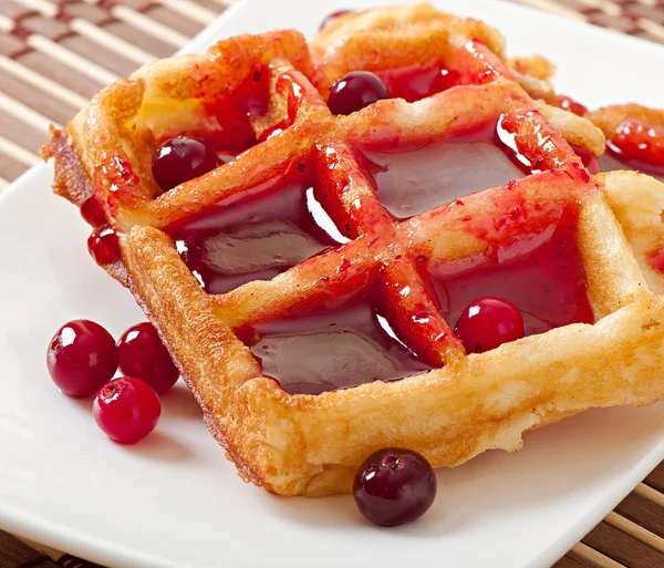Waffles with cranberry syrup — Stock Photo, Image