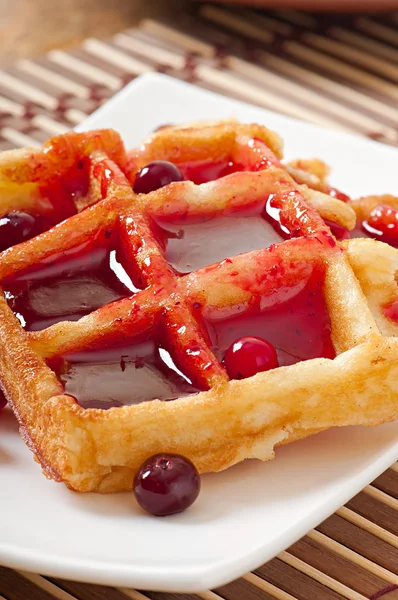 Waffles with cranberry syrup — Stock Photo, Image