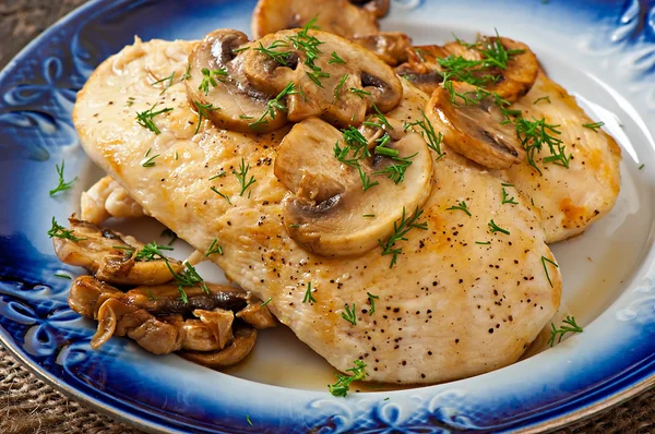 Chicken breast grilled with mushrooms — Stock Photo, Image