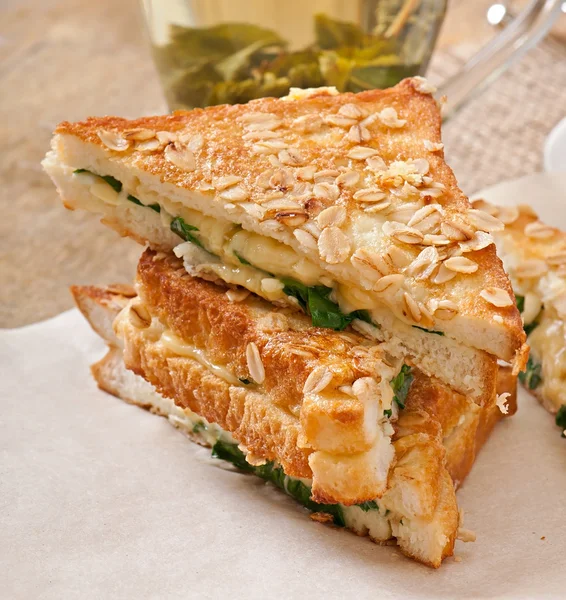 stock image Warm toast with cheese and spinach