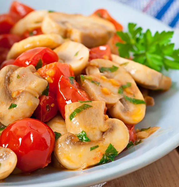 Sauteed mushrooms with tomatoes — Stock Photo, Image