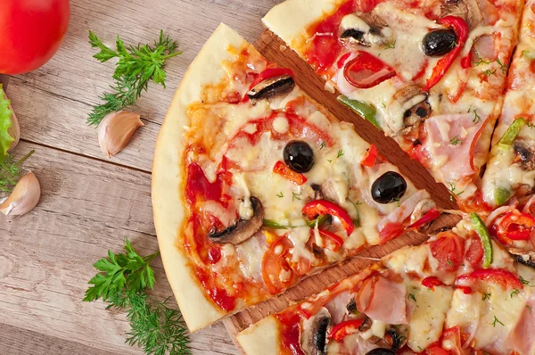 Pizza with ham and mushrooms — Stock Photo, Image