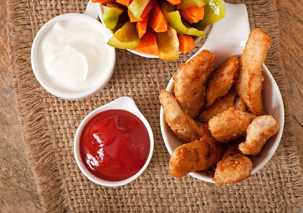 Chicken nuggets with sauces — Stock Photo, Image