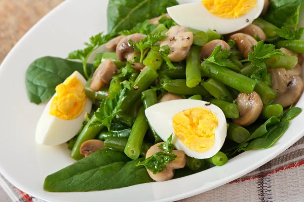 Mushroom salad with beans and eggs — Stock Photo, Image