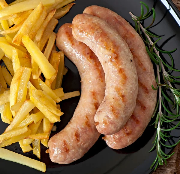 Embutidos de pollo con papas fritas — Foto de Stock