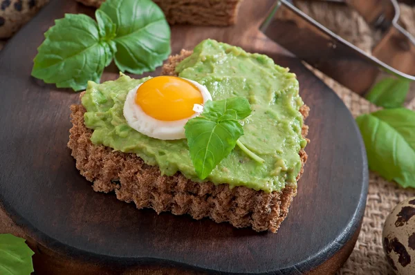 Sandwich with avocado paste and egg — Stock Photo, Image