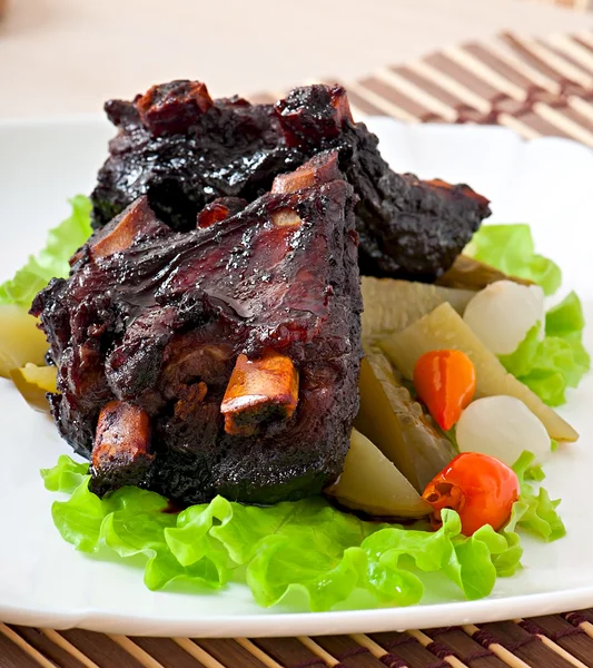 Baked beef ribs with  vegetables