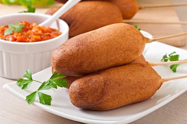 Homemade corn dogs with sauces — Stock Photo, Image