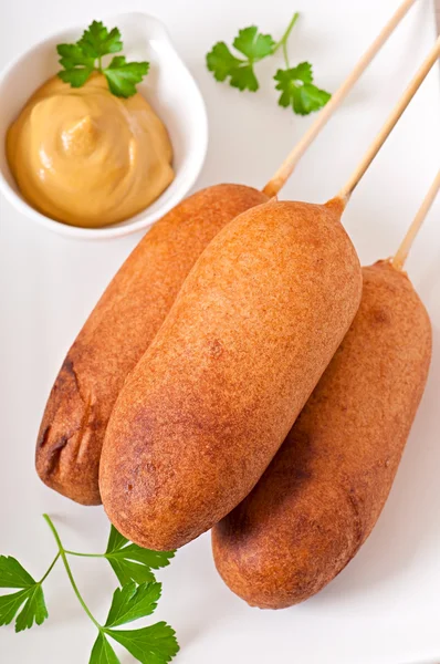 Homemade corn dogs with sauces — Stock Photo, Image