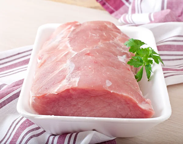 Piece of raw pork meat on the table — Stock Photo, Image