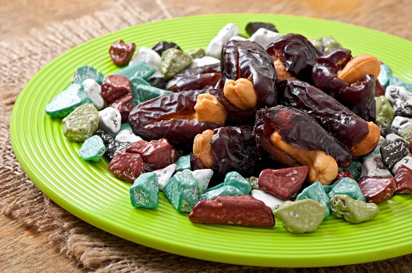 Oriental sweets with cashew and chocolates — Stock Photo, Image