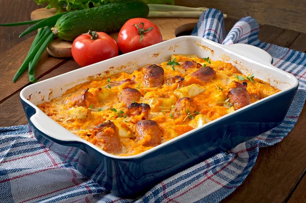 Casserole with sausage, bacon and apples — Stock Photo, Image