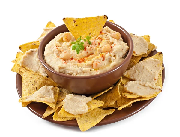 Hummus with olive oil and pita chips — Stock Photo, Image
