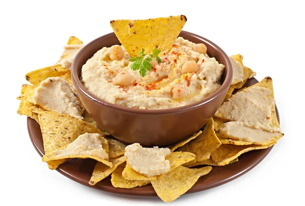 Hummus with olive oil and pita chips — Stock Photo, Image