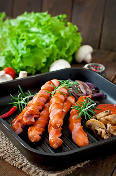 Grilled sausages with vegetables — Stock Photo, Image