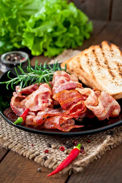 Fried bacon and toast — Stock Photo, Image