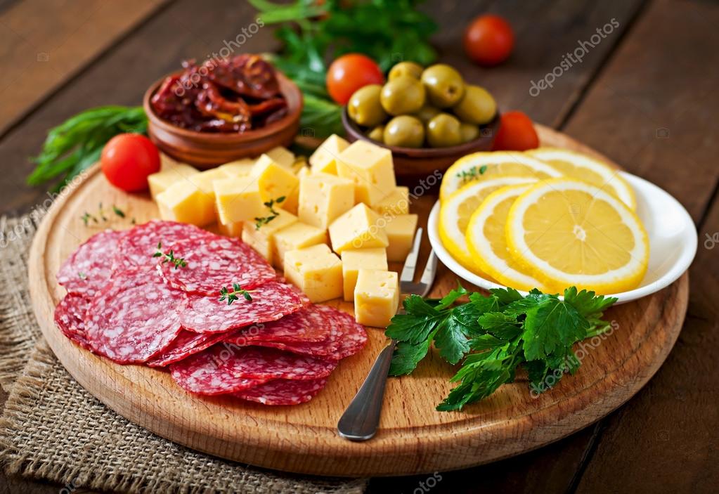 Antipasto catering platter with salami and cheese — Stock Photo