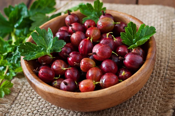 Ripe gooseberries in a plate — Stock Photo, Image