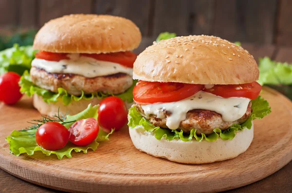 Hamburgers with chicken ,vegetables  and sauce — Stock Photo, Image